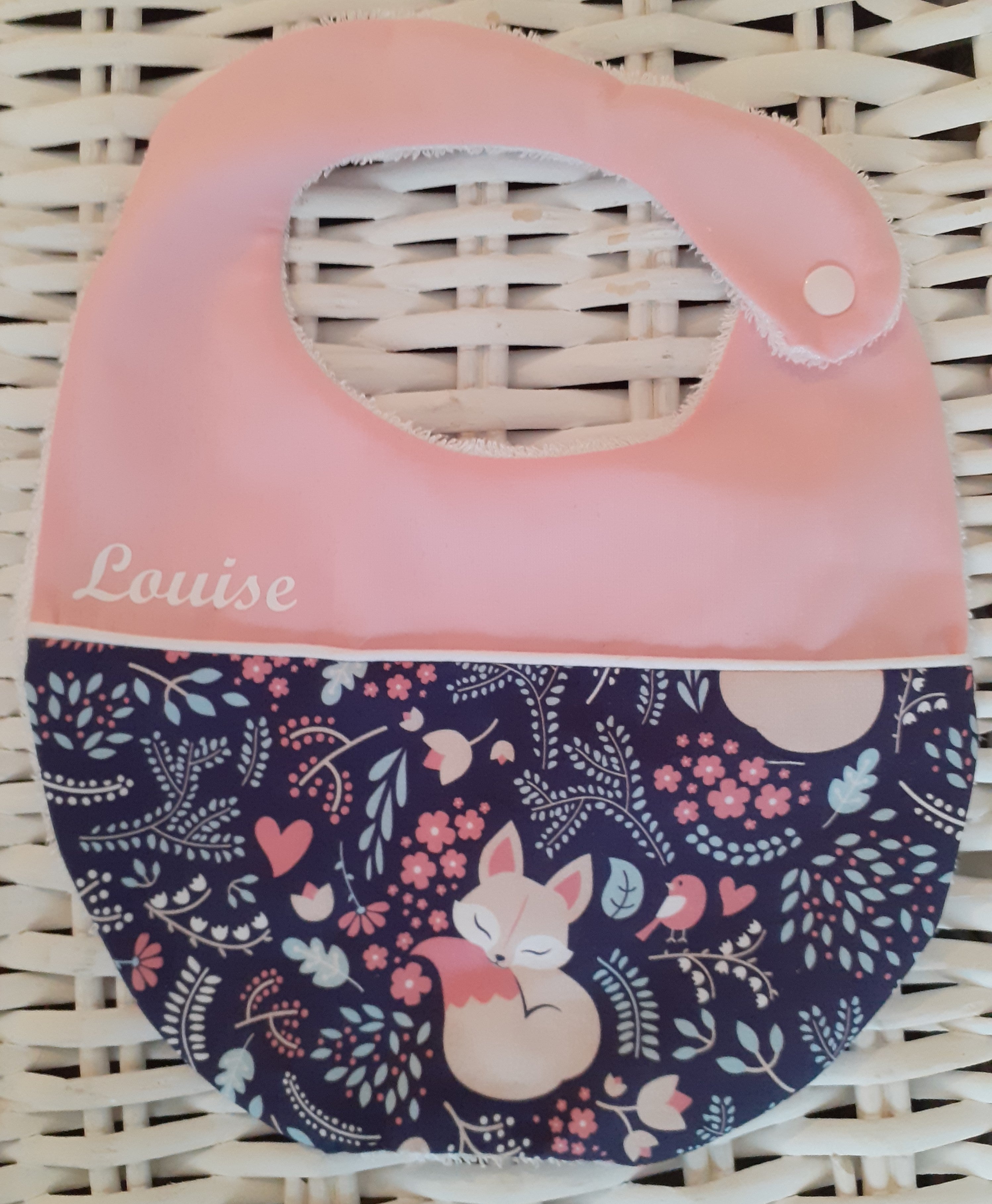 Le bavoir renard rose