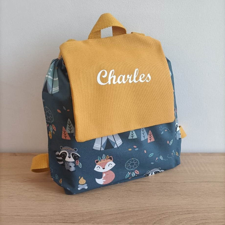 Le sac à dos tipis/moutarde